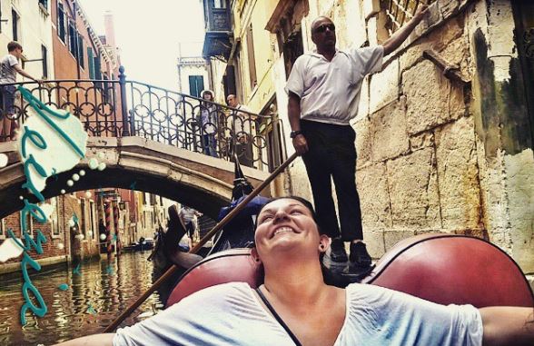  Me, on a gondola in Venice. My gondolier was NOT impressed. 